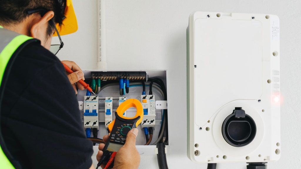 Technician installing charger